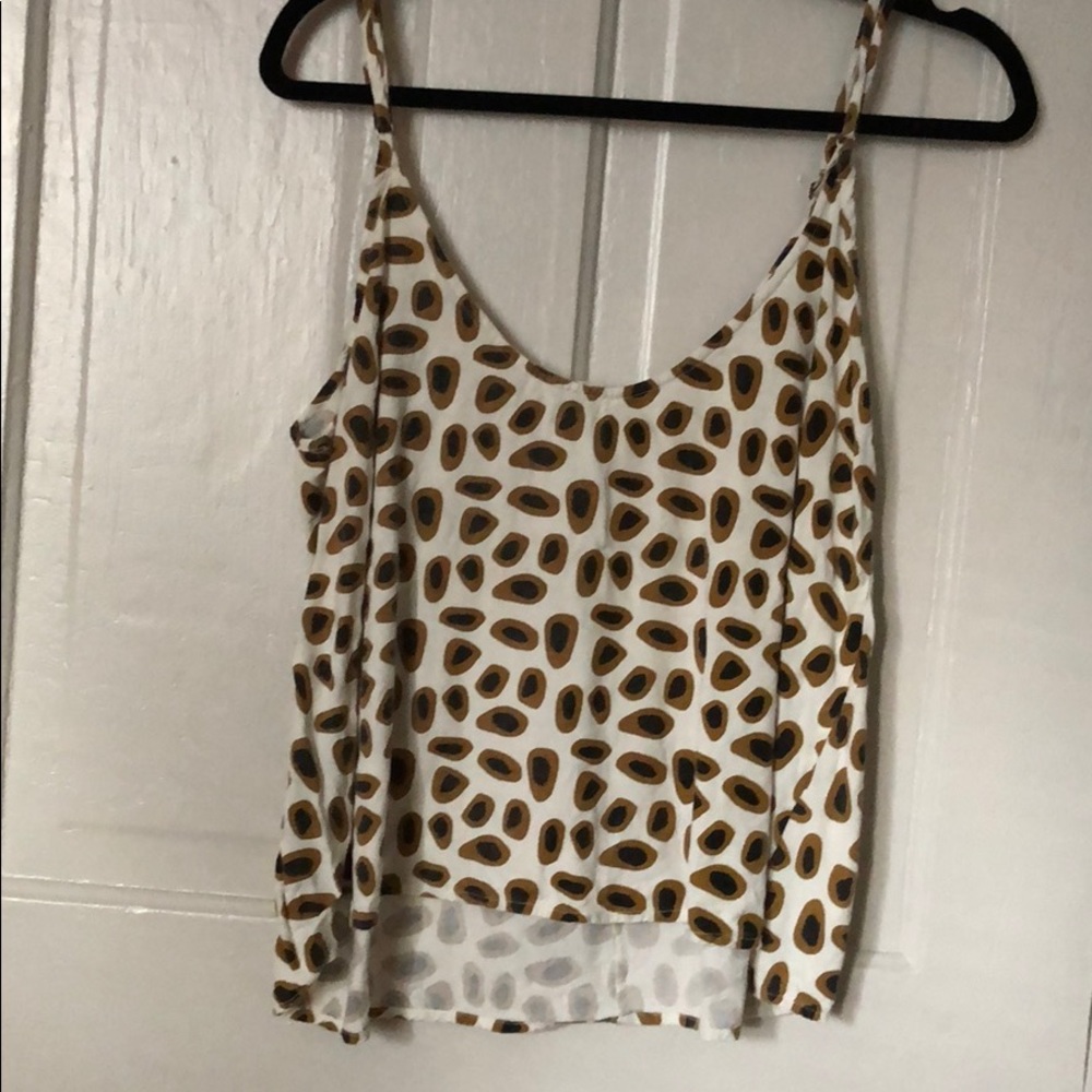 Ali Golden tank top.